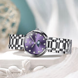 OLEVS 5573 Women's Quartz Watch with Arabic numerals and Diamond Dial Design, Blue Hands, Date Display, 3ATM Water Resistance